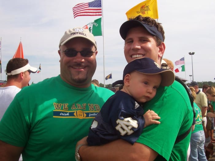Nolan Ziegler with his father, Bryan Ziegler, and Notre Dame legend Chris Zorich. This was at the Notre Dame/Michigan game in 2004.
